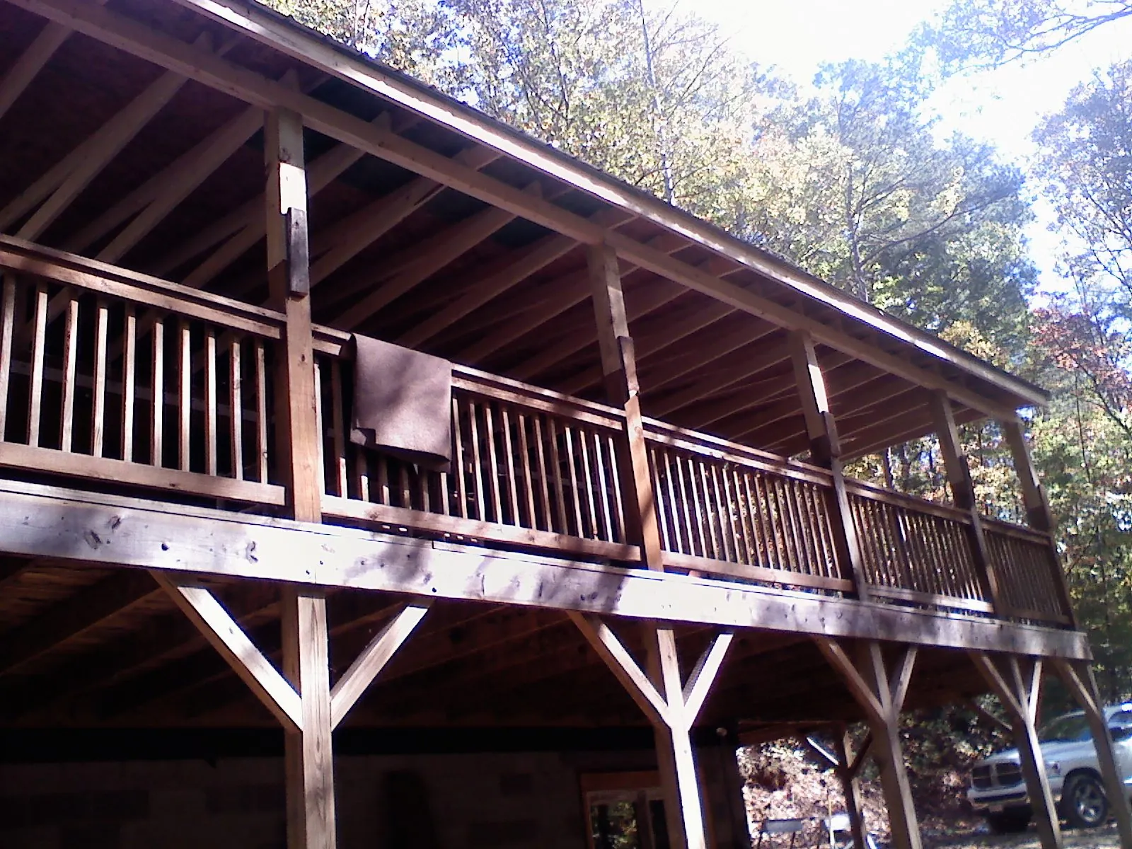 Timber framing under a new elevated porch and deck — Roof Leak Repair in Snowmass by Roofing Brothers